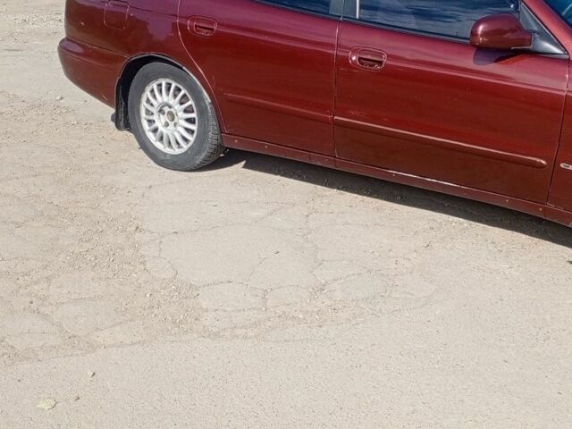 Коричневый Дэу Леганза, объемом двигателя 2 л и пробегом 270 тыс. км за 1500 $, фото 4 на Automoto.ua