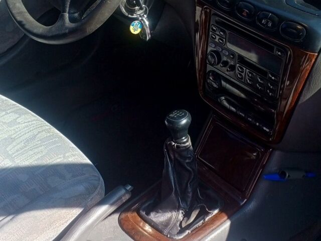 Коричневый Дэу Леганза, объемом двигателя 2 л и пробегом 270 тыс. км за 1500 $, фото 1 на Automoto.ua