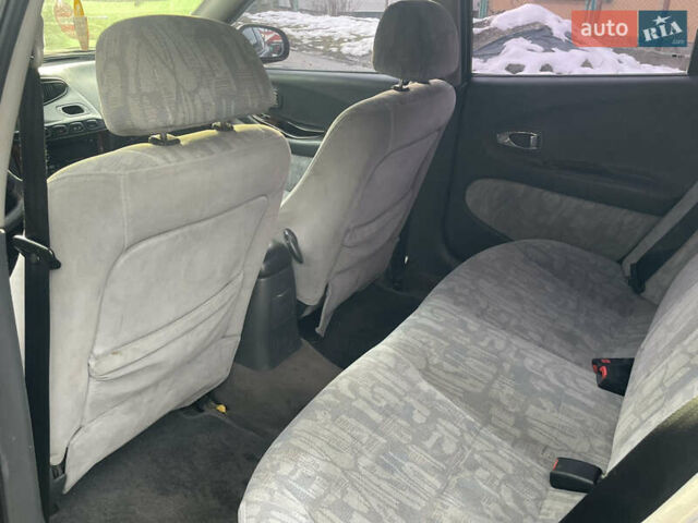 Коричневый Дэу Леганза, объемом двигателя 2 л и пробегом 250 тыс. км за 1400 $, фото 5 на Automoto.ua