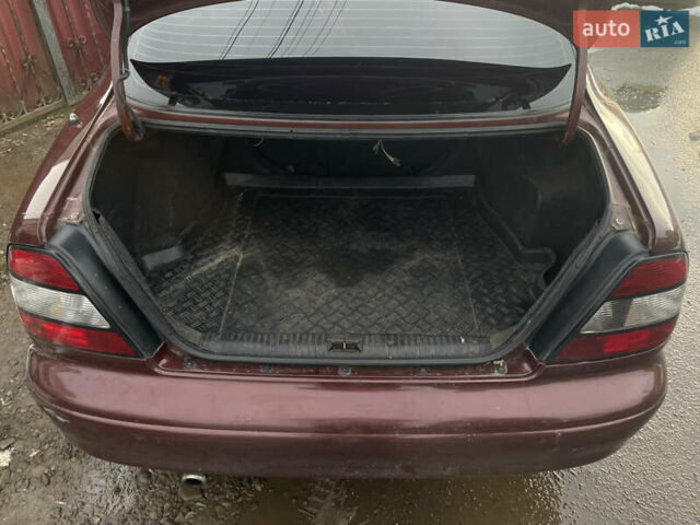 Коричневый Дэу Леганза, объемом двигателя 2 л и пробегом 250 тыс. км за 1400 $, фото 6 на Automoto.ua