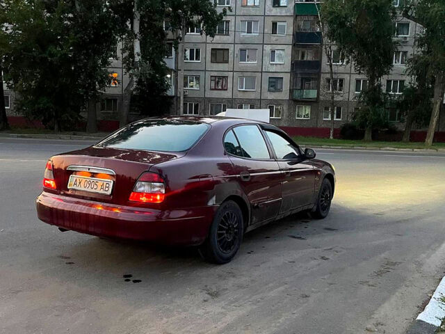 Красный Дэу Леганза, объемом двигателя 2 л и пробегом 337 тыс. км за 850 $, фото 2 на Automoto.ua