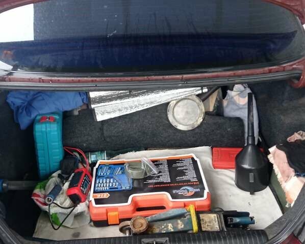 Красный Дэу Леганза, объемом двигателя 2 л и пробегом 450 тыс. км за 1185 $, фото 9 на Automoto.ua