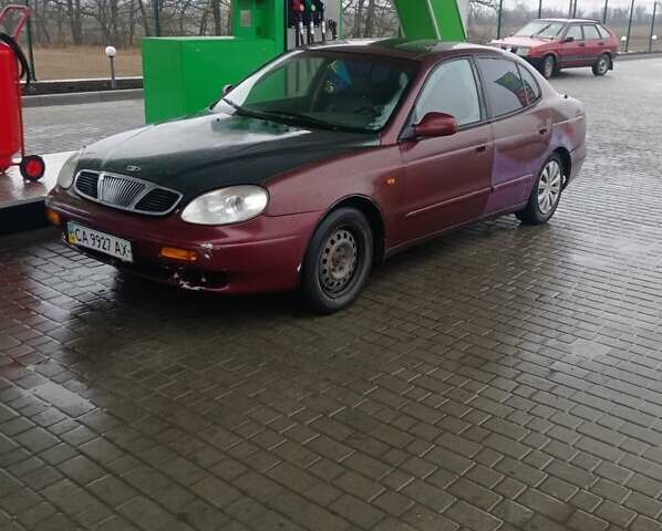 Красный Дэу Леганза, объемом двигателя 2 л и пробегом 450 тыс. км за 1185 $, фото 1 на Automoto.ua