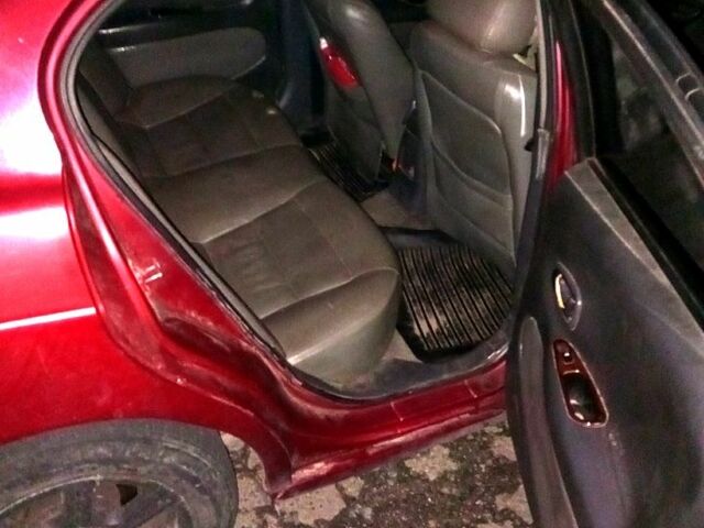 Красный Дэу Леганза, объемом двигателя 2 л и пробегом 200 тыс. км за 850 $, фото 4 на Automoto.ua