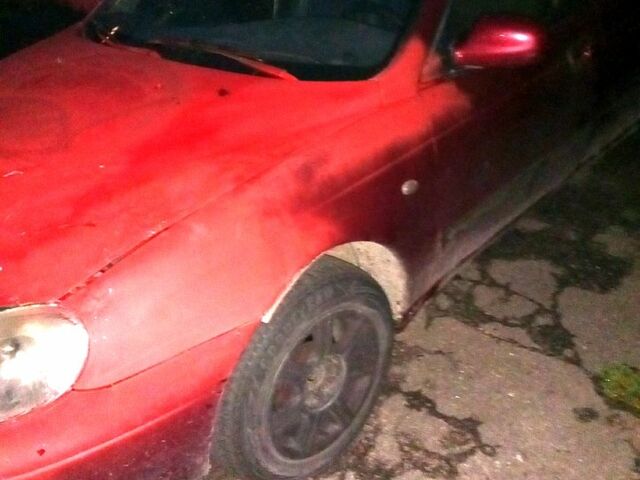 Красный Дэу Леганза, объемом двигателя 2 л и пробегом 200 тыс. км за 850 $, фото 5 на Automoto.ua