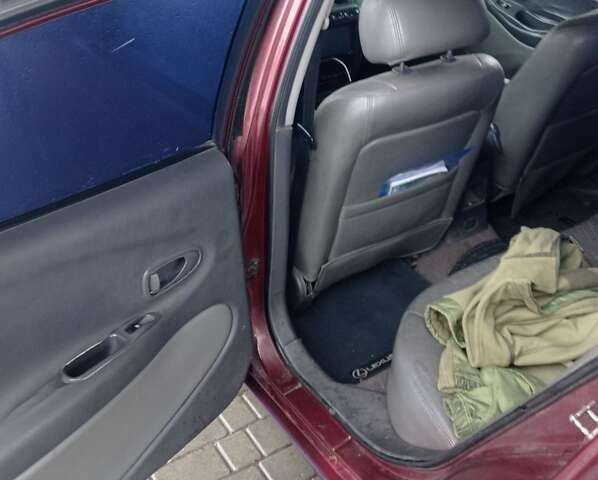 Красный Дэу Леганза, объемом двигателя 2 л и пробегом 450 тыс. км за 1185 $, фото 8 на Automoto.ua