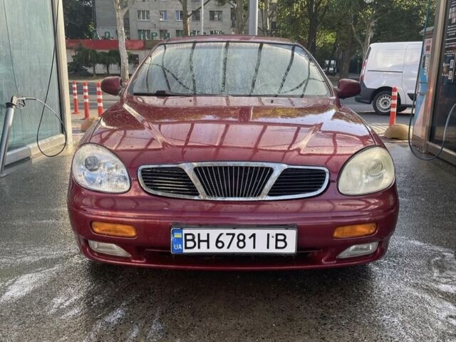 Красный Дэу Леганза, объемом двигателя 2 л и пробегом 150 тыс. км за 1100 $, фото 3 на Automoto.ua