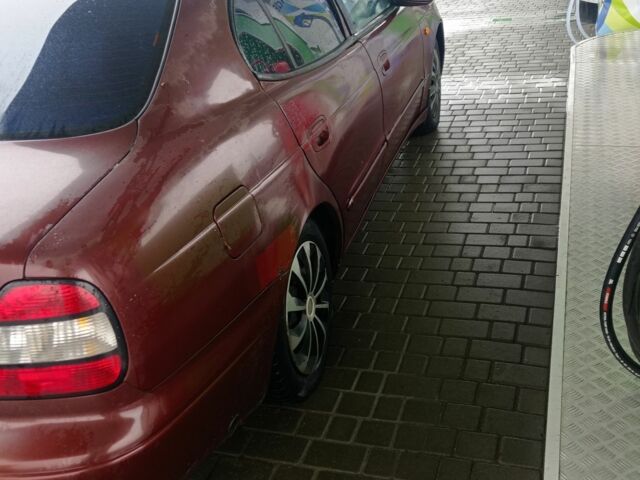 Красный Дэу Леганза, объемом двигателя 2 л и пробегом 450 тыс. км за 1187 $, фото 5 на Automoto.ua