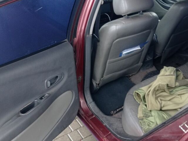 Красный Дэу Леганза, объемом двигателя 2 л и пробегом 450 тыс. км за 1187 $, фото 8 на Automoto.ua