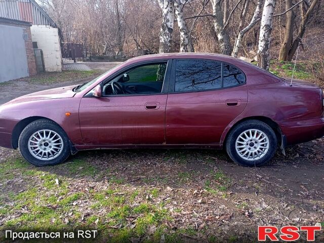 Красный Дэу Леганза, объемом двигателя 2 л и пробегом 0 тыс. км за 1000 $, фото 5 на Automoto.ua