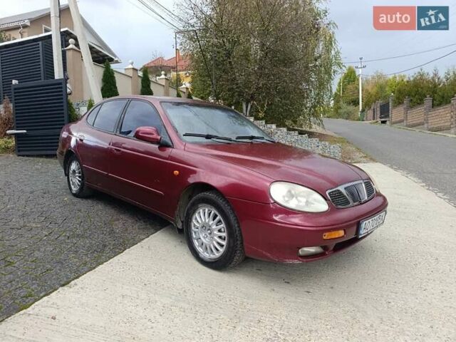 Червоний Деу Леганза, об'ємом двигуна 2 л та пробігом 285 тис. км за 1999 $, фото 3 на Automoto.ua