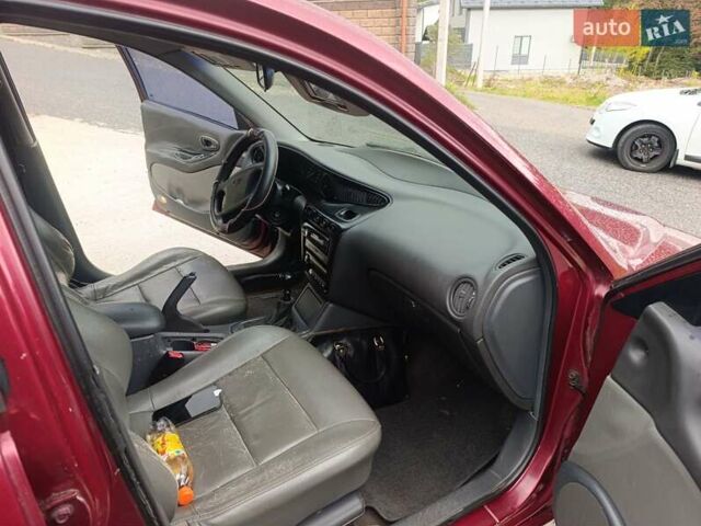 Червоний Деу Леганза, об'ємом двигуна 2 л та пробігом 285 тис. км за 1999 $, фото 4 на Automoto.ua