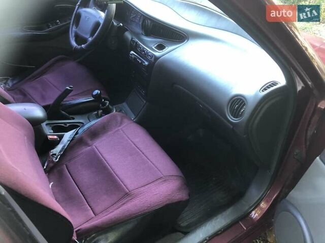 Красный Дэу Леганза, объемом двигателя 2 л и пробегом 285 тыс. км за 1250 $, фото 6 на Automoto.ua