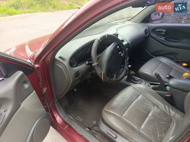 Червоний Деу Леганза, об'ємом двигуна 2 л та пробігом 285 тис. км за 1750 $, фото 5 на Automoto.ua