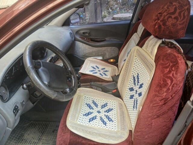 Дэу Леганза 1999 в Краматорске на Automoto.ua Красный Дэу Леганза, объемом двигателя 2 л и пробегом 250 тыс. км за 2000 $, фото 4 на Automoto.ua