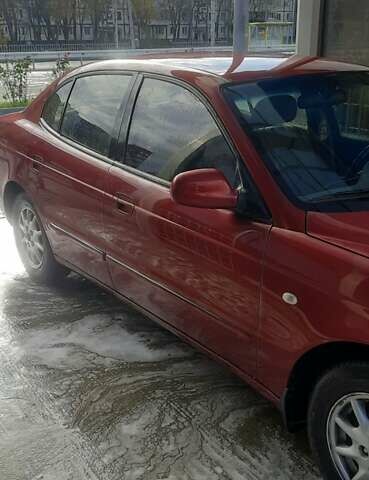 Красный Дэу Леганза, объемом двигателя 2 л и пробегом 253 тыс. км за 2800 $, фото 2 на Automoto.ua