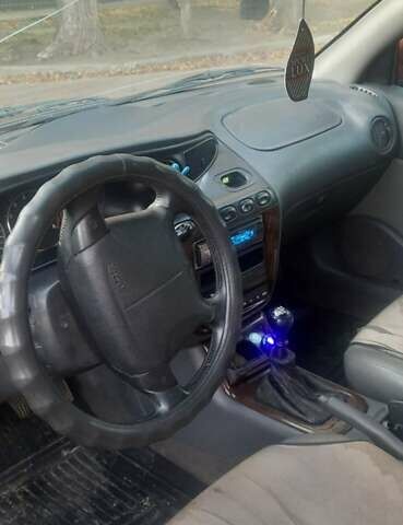 Красный Дэу Леганза, объемом двигателя 2 л и пробегом 253 тыс. км за 2800 $, фото 11 на Automoto.ua