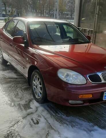 Красный Дэу Леганза, объемом двигателя 2 л и пробегом 253 тыс. км за 2800 $, фото 1 на Automoto.ua