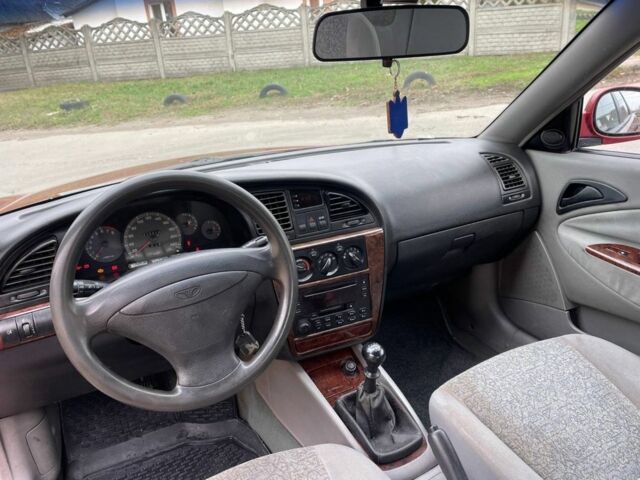 Красный Дэу Леганза, объемом двигателя 2 л и пробегом 185 тыс. км за 2450 $, фото 6 на Automoto.ua