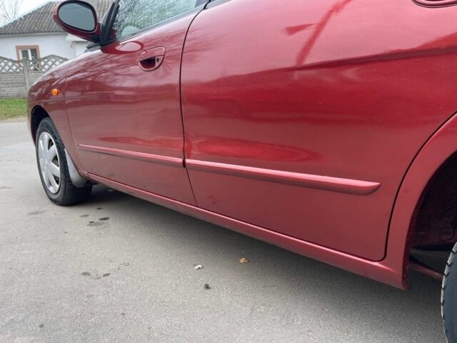 Красный Дэу Леганза, объемом двигателя 2 л и пробегом 185 тыс. км за 2450 $, фото 9 на Automoto.ua