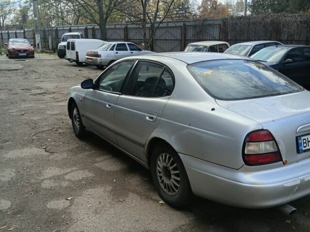 Сірий Деу Леганза, об'ємом двигуна 2 л та пробігом 133 тис. км за 900 $, фото 4 на Automoto.ua