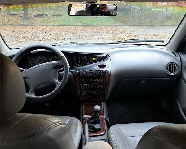 Серый Дэу Леганза, объемом двигателя 2 л и пробегом 447 тыс. км за 1899 $, фото 15 на Automoto.ua