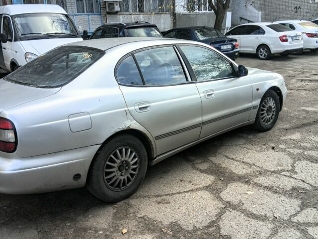 Сірий Деу Леганза, об'ємом двигуна 2 л та пробігом 133 тис. км за 900 $, фото 2 на Automoto.ua