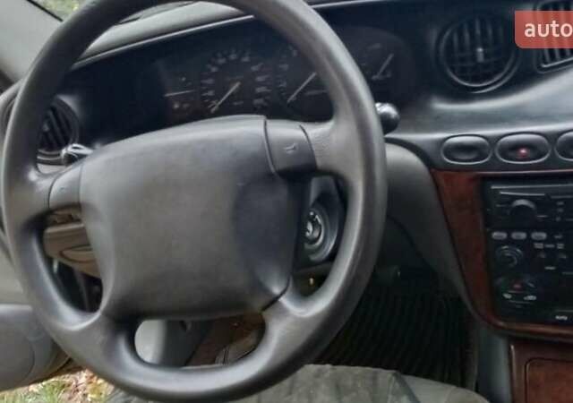 Серый Дэу Леганза, объемом двигателя 2 л и пробегом 300 тыс. км за 1183 $, фото 5 на Automoto.ua