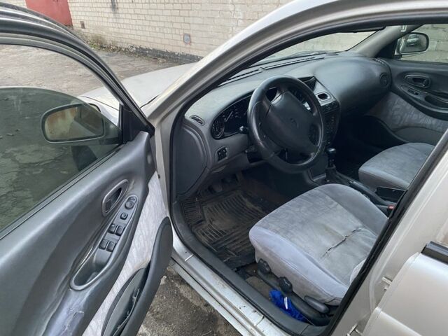 Серый Дэу Леганза, объемом двигателя 2 л и пробегом 235 тыс. км за 1400 $, фото 1 на Automoto.ua