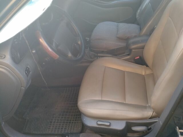 Синий Дэу Леганза, объемом двигателя 2 л и пробегом 300 тыс. км за 1200 $, фото 4 на Automoto.ua