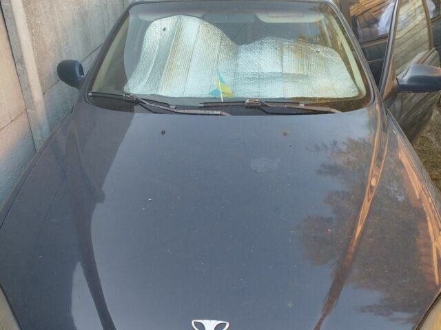 Синий Дэу Леганза, объемом двигателя 2 л и пробегом 300 тыс. км за 1200 $, фото 3 на Automoto.ua