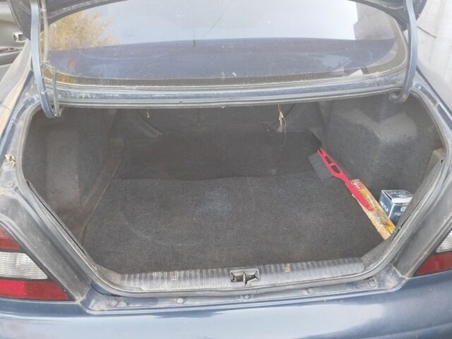 Синий Дэу Леганза, объемом двигателя 2 л и пробегом 300 тыс. км за 1200 $, фото 2 на Automoto.ua