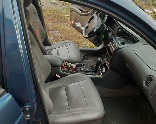 Синий Дэу Леганза, объемом двигателя 2.2 л и пробегом 350 тыс. км за 3900 $, фото 4 на Automoto.ua