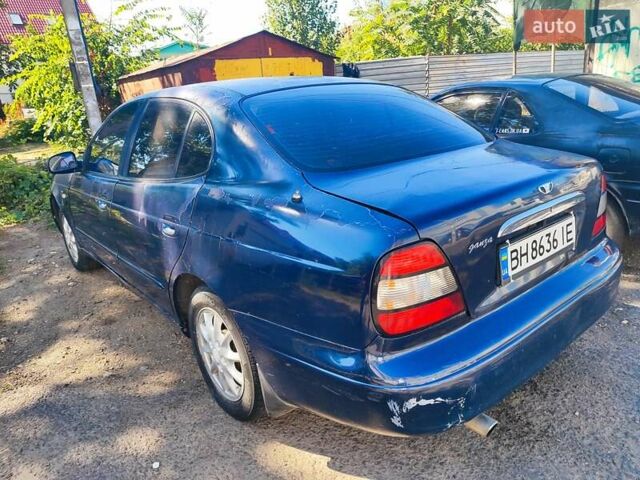 Синий Дэу Леганза, объемом двигателя 2 л и пробегом 200 тыс. км за 1200 $, фото 3 на Automoto.ua