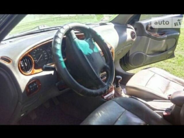 Зелений Деу Леганза, об'ємом двигуна 1.6 л та пробігом 200 тис. км за 2625 $, фото 2 на Automoto.ua