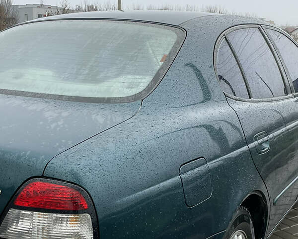 Зеленый Дэу Леганза, объемом двигателя 2 л и пробегом 265 тыс. км за 2300 $, фото 8 на Automoto.ua