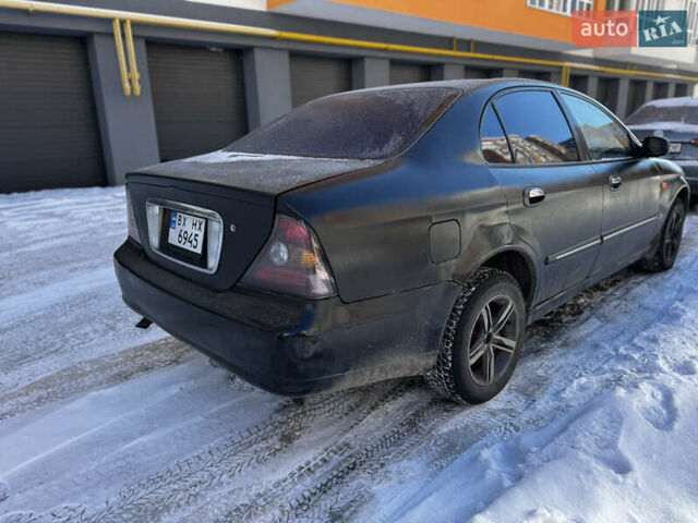 Чорний Деу Магнус, об'ємом двигуна 2 л та пробігом 390 тис. км за 2000 $, фото 6 на Automoto.ua