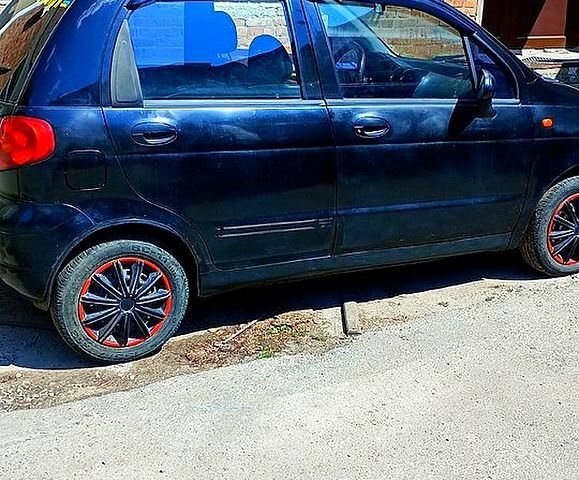 Черный Дэу Матиз, объемом двигателя 0.8 л и пробегом 150 тыс. км за 1600 $, фото 2 на Automoto.ua