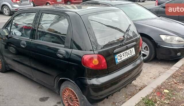 Черный Дэу Матиз, объемом двигателя 0.8 л и пробегом 150 тыс. км за 1950 $, фото 3 на Automoto.ua