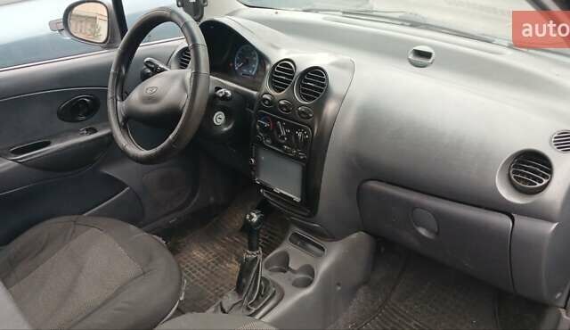 Черный Дэу Матиз, объемом двигателя 0.8 л и пробегом 150 тыс. км за 1950 $, фото 4 на Automoto.ua