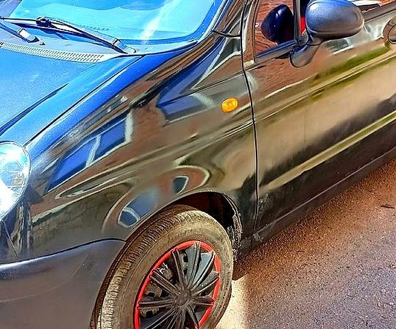 Черный Дэу Матиз, объемом двигателя 0.8 л и пробегом 150 тыс. км за 1600 $, фото 1 на Automoto.ua