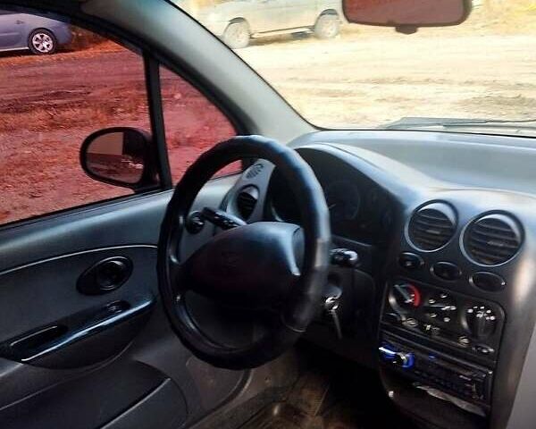 Черный Дэу Матиз, объемом двигателя 0.8 л и пробегом 120 тыс. км за 1800 $, фото 1 на Automoto.ua