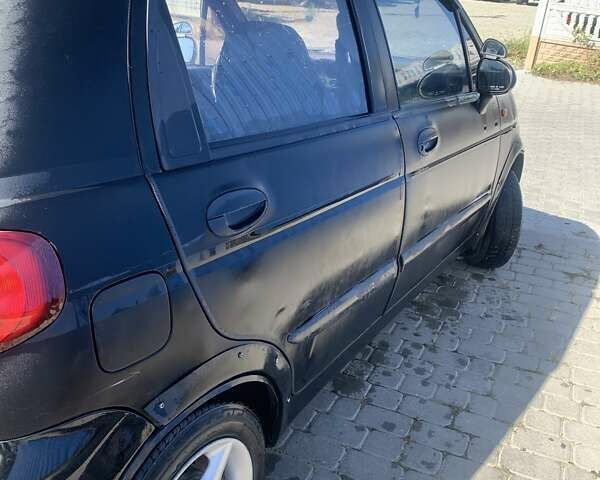 Черный Дэу Матиз, объемом двигателя 0.8 л и пробегом 185 тыс. км за 2000 $, фото 10 на Automoto.ua