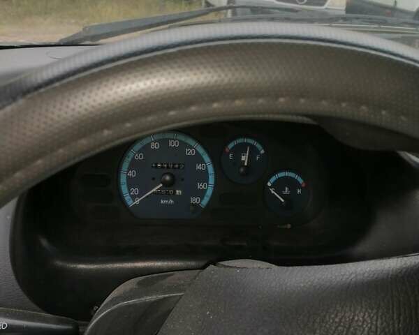 Черный Дэу Матиз, объемом двигателя 0.8 л и пробегом 199 тыс. км за 1300 $, фото 2 на Automoto.ua