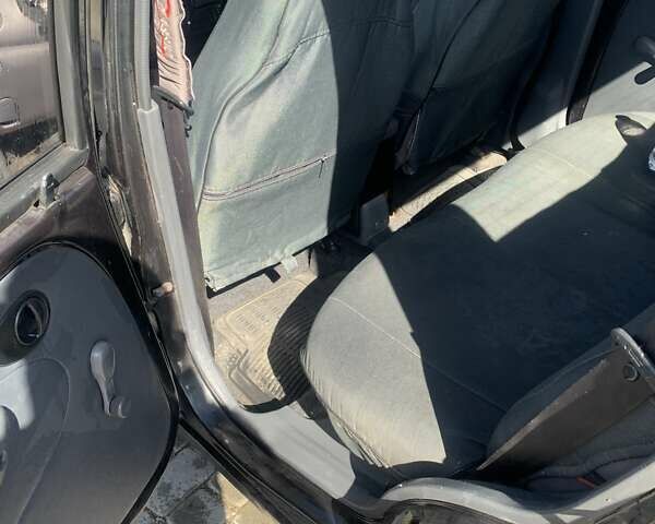 Черный Дэу Матиз, объемом двигателя 0.8 л и пробегом 185 тыс. км за 2000 $, фото 6 на Automoto.ua