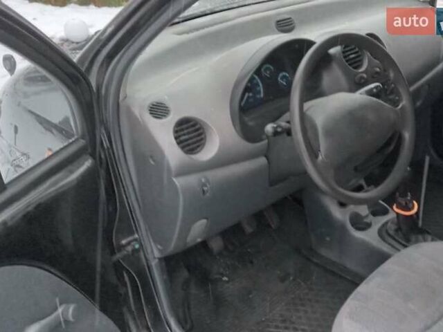 Черный Дэу Матиз, объемом двигателя 0.8 л и пробегом 115 тыс. км за 1800 $, фото 2 на Automoto.ua
