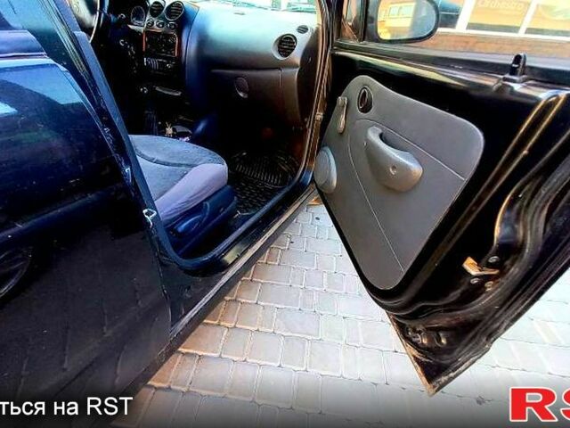 Черный Дэу Матиз, объемом двигателя 0.8 л и пробегом 125 тыс. км за 1850 $, фото 2 на Automoto.ua