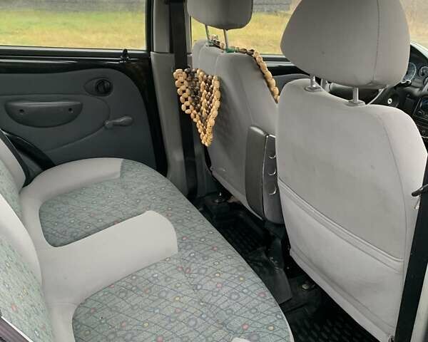 Черный Дэу Матиз, объемом двигателя 0.8 л и пробегом 141 тыс. км за 2400 $, фото 6 на Automoto.ua