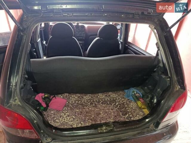 Черный Дэу Матиз, объемом двигателя 0.8 л и пробегом 250 тыс. км за 1500 $, фото 8 на Automoto.ua