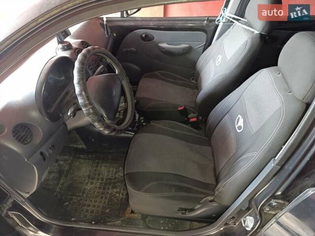 Черный Дэу Матиз, объемом двигателя 0.8 л и пробегом 250 тыс. км за 1500 $, фото 10 на Automoto.ua